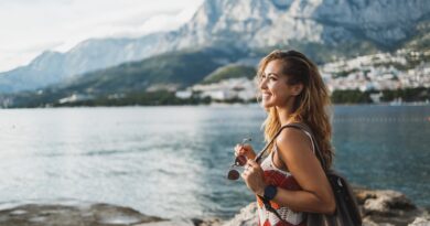 Woman Enjoying A Summer Vacation While Exploring Mediterranean Coast