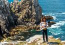 A young woman on vacation at Pen Hir Point on the Crozon Peninsula in French Brittany