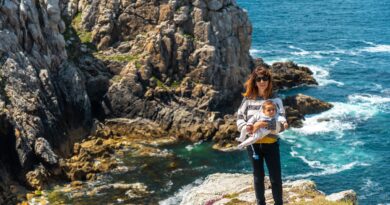 A young woman on vacation at Pen Hir Point on the Crozon Peninsula in French Brittany