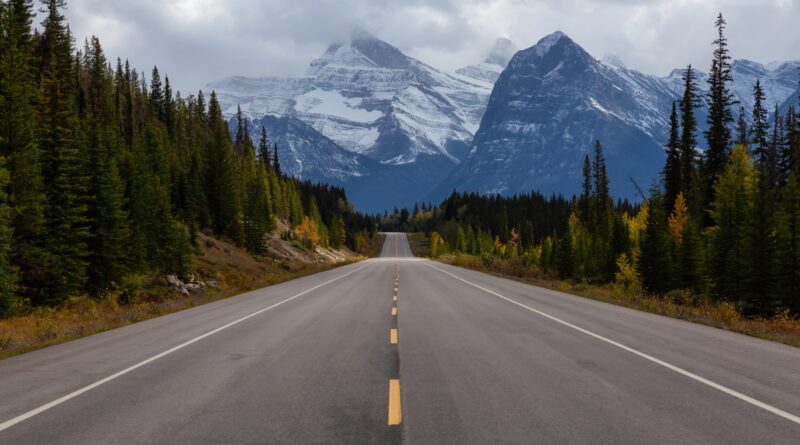 Scenic road in the Canadian Rockies during Fall Season